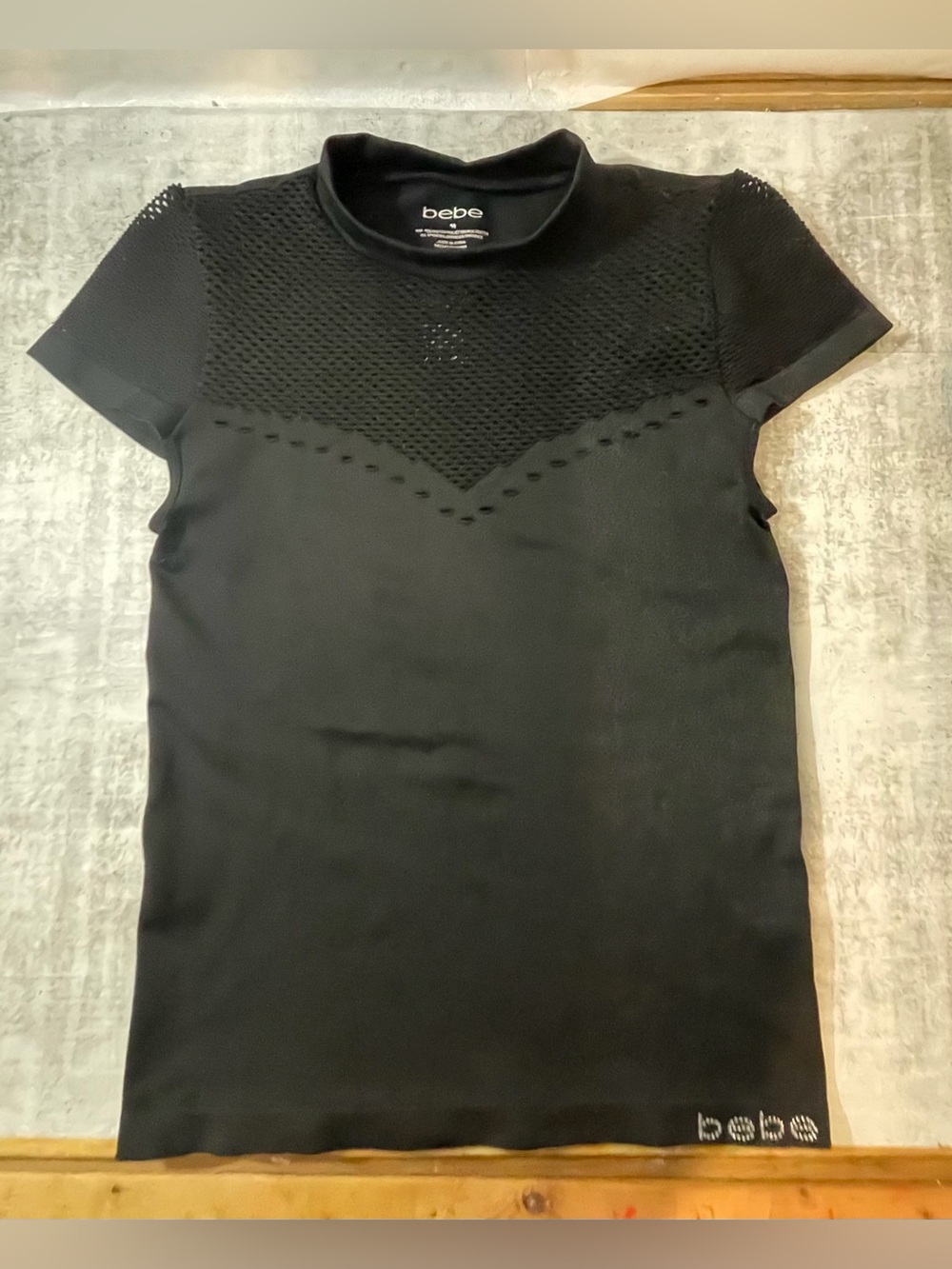 bebe Ladies Black Stretchy Short Sleeve Top in Great Condition. Size Medium.  $7
